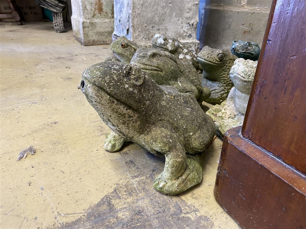 Eight reconstituted stone garden ornaments of frogs and toads, three as fountain heads, largest 18cm high